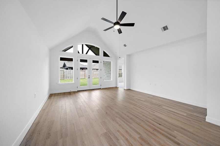 Representative unfurnished interior of a home built from the Cardinal by Caldwell Homes in Chambers Creek, Willis (Image 17).