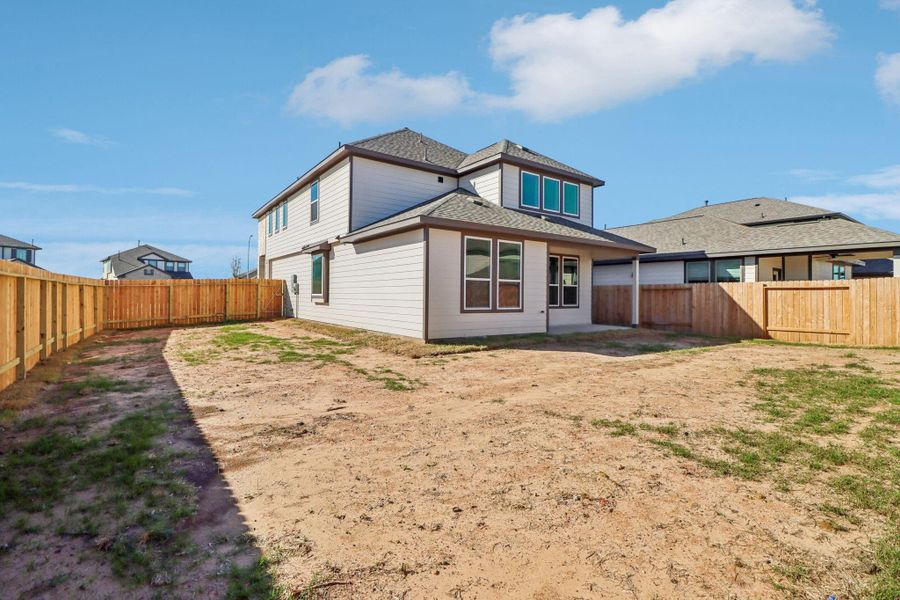 Exterior details and patio area of a home in Bluestem, Brookshire (Image 4).