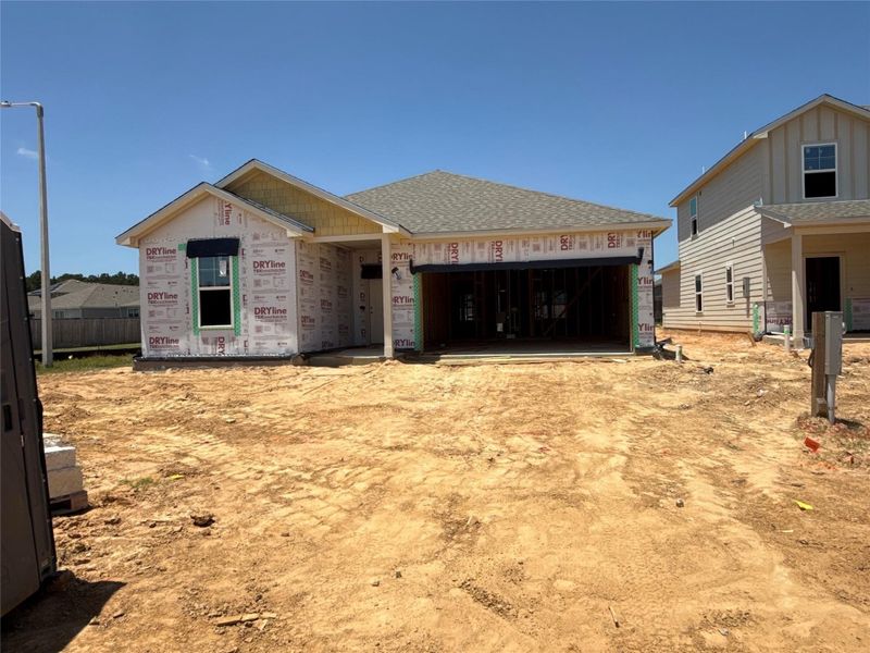 In-progress construction of a new home in Caney Mills, Conroe, TX (Image 23).