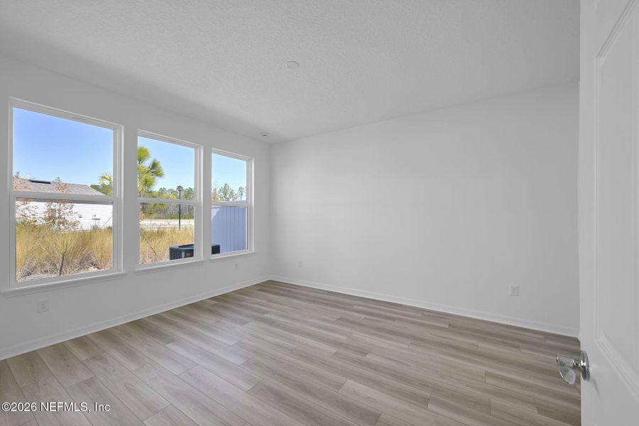 Spacious, unfurnished interior of a new home in Del Webb Wildlight, Yulee (Image 16).