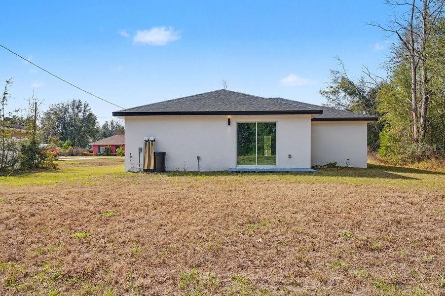 Exterior details and patio area of a home in , Ocala (Image 17).