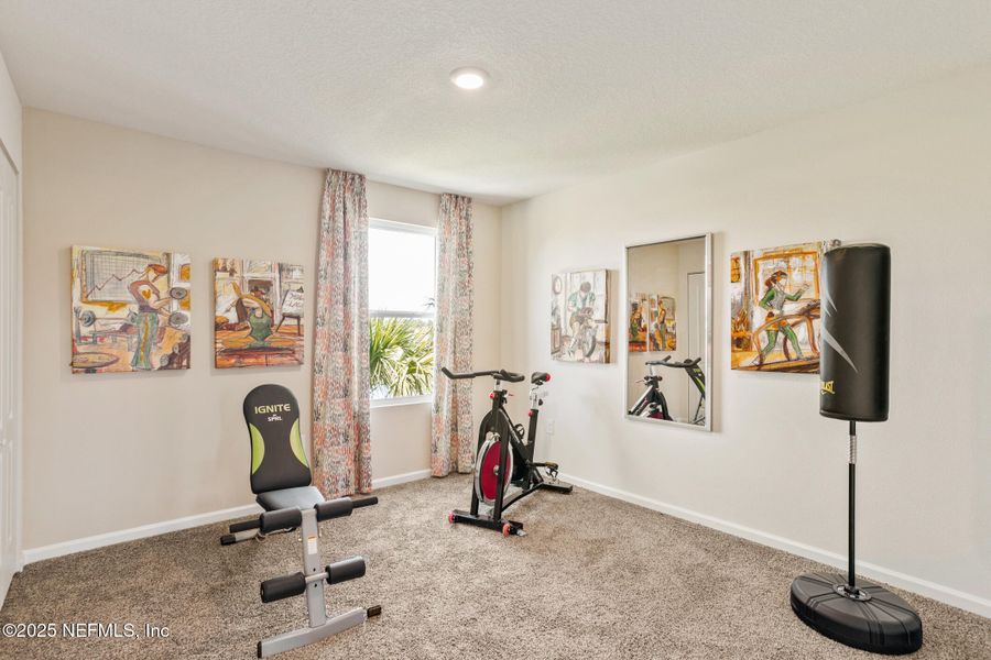 Furnished interior view inside a new home in Sawmill Branch, Palm Coast (Image 24).
