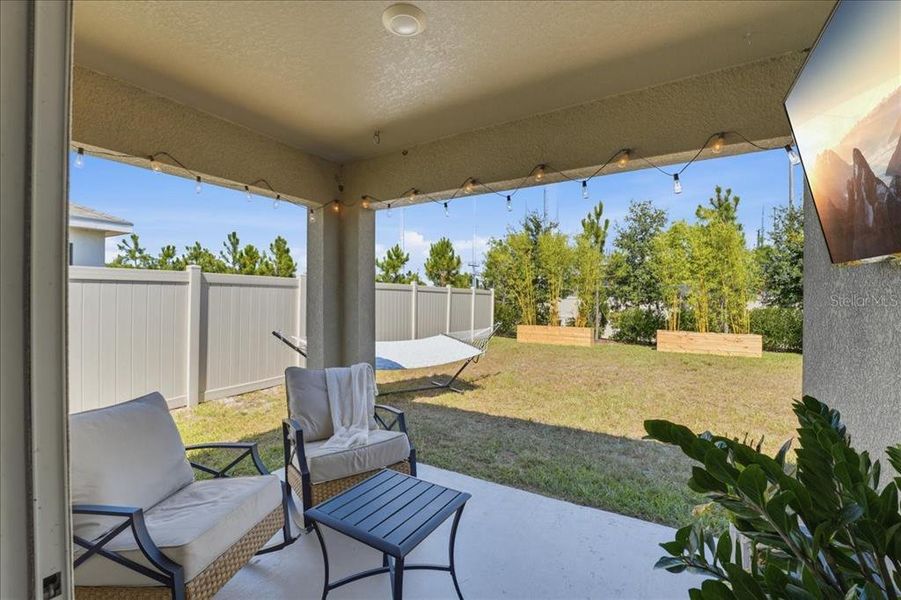 Exterior details and patio area of a home in Bella Lago, Parrish (Image 3).