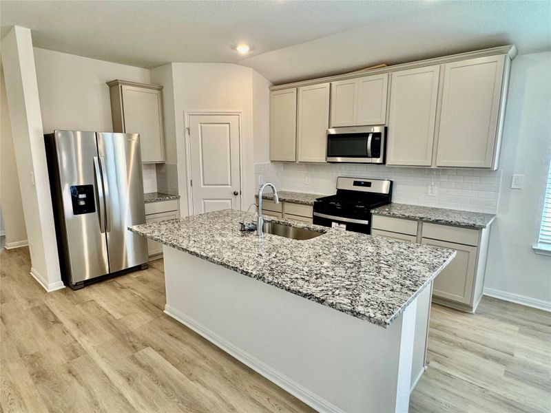 Furnished interior view inside a new home in Prairie Winds - Reserve Collection, Hutto (Image 5).
