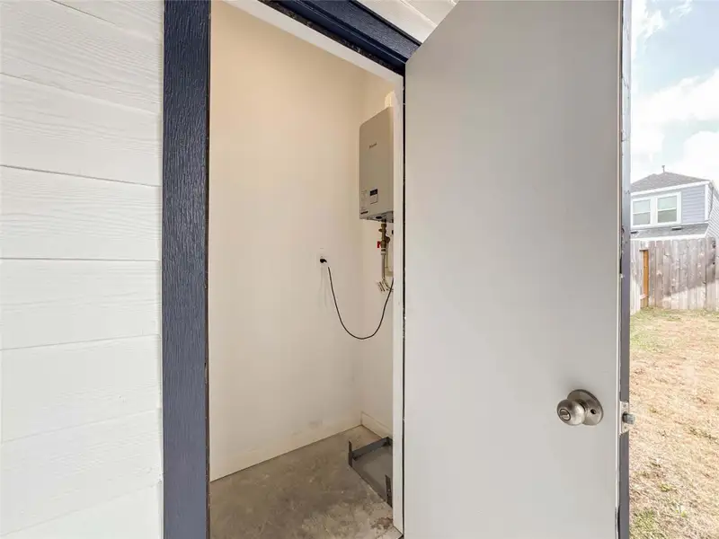 Exterior details and patio area of a home in , Houston (Image 3).