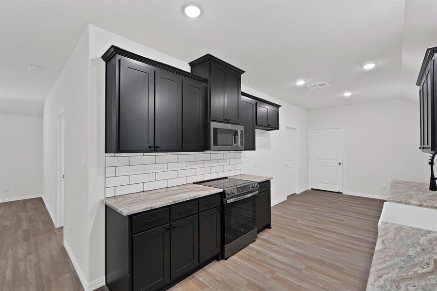 Furnished interior view inside a new home in , Poolville (Image 9).