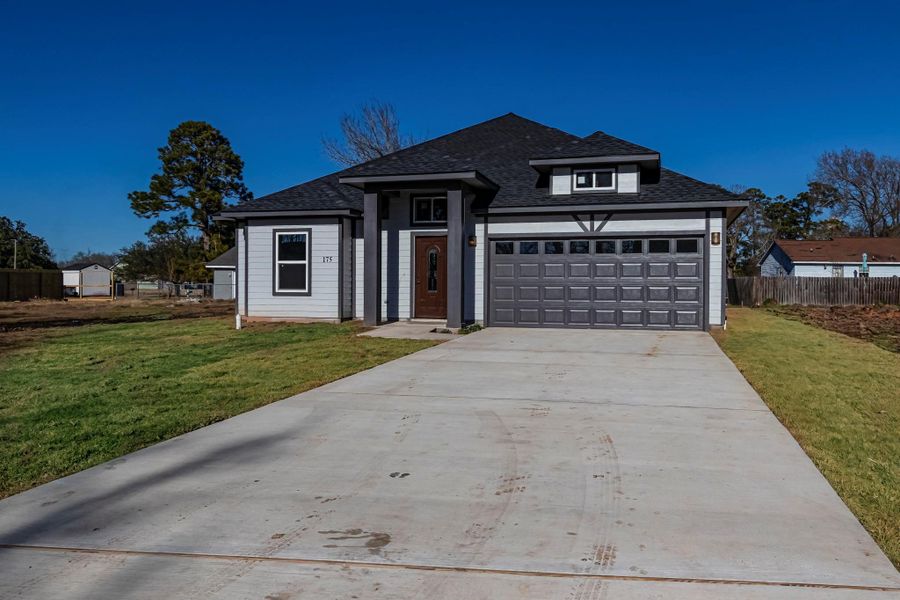 Front exterior of a new home in , Livingston, TX, highlighting curb appeal (Image 22). Front exterior of a new home in , Livingston, TX, highlighting curb appeal (Image 22).
