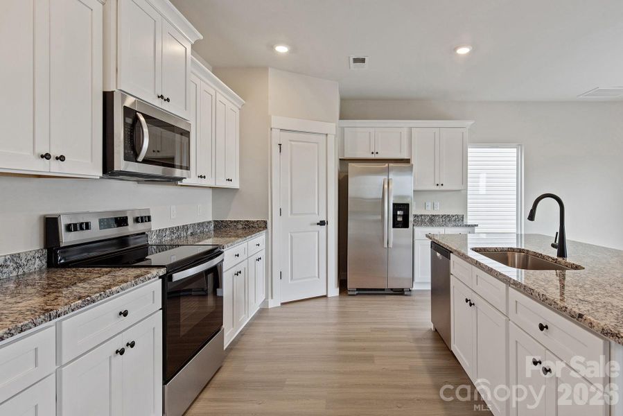 Furnished interior view inside a new home in Knights Bridge, Richburg (Image 6).