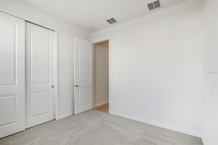 Spacious, unfurnished interior of a new home in Coasterra - Reserve Series, Palmetto (Image 38).