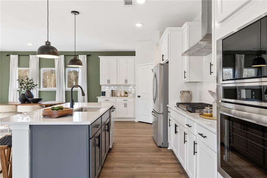 Furnished interior view inside a new home in The Bluffs, Canton (Image 32).