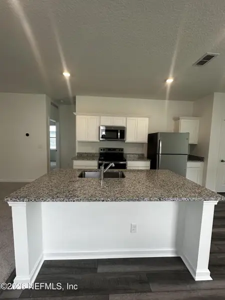 Furnished interior view inside a new home in , Palm Coast (Image 6).
