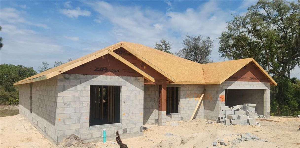 Front exterior of a new home in Poinciana - Polk County, Poinciana, FL, highlighting curb appeal (Image 2).