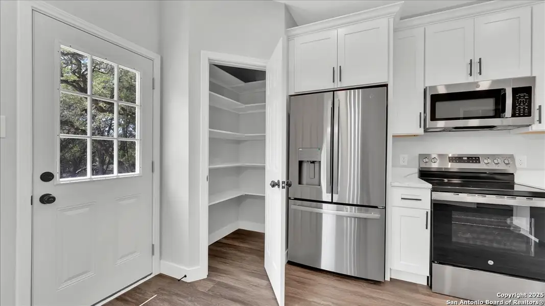 Furnished interior view inside a new home in , Bandera (Image 5). Furnished interior view inside a new home in , Bandera (Image 5).
