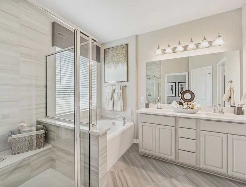 Representative furnished interior of a home built from the Margaux by Chesmar Homes in Meridiana Chateau, Manvel (Image 16).
