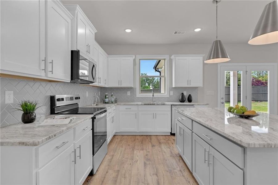 Furnished interior view inside a new home in , Buford (Image 9).