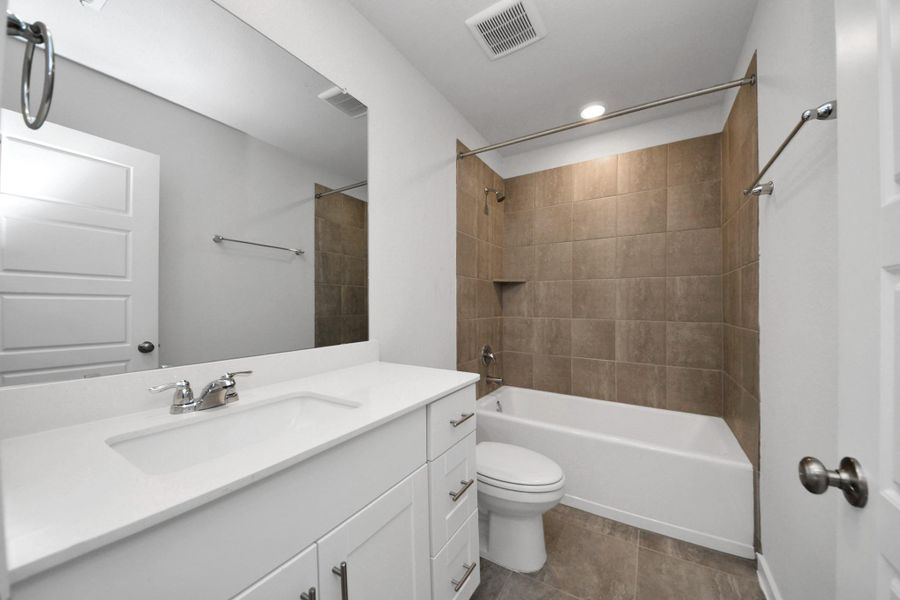 Furnished interior view inside a new home in Montgomery Oaks - Premier, Conroe (Image 16). Furnished interior view inside a new home in Montgomery Oaks - Premier, Conroe (Image 16).