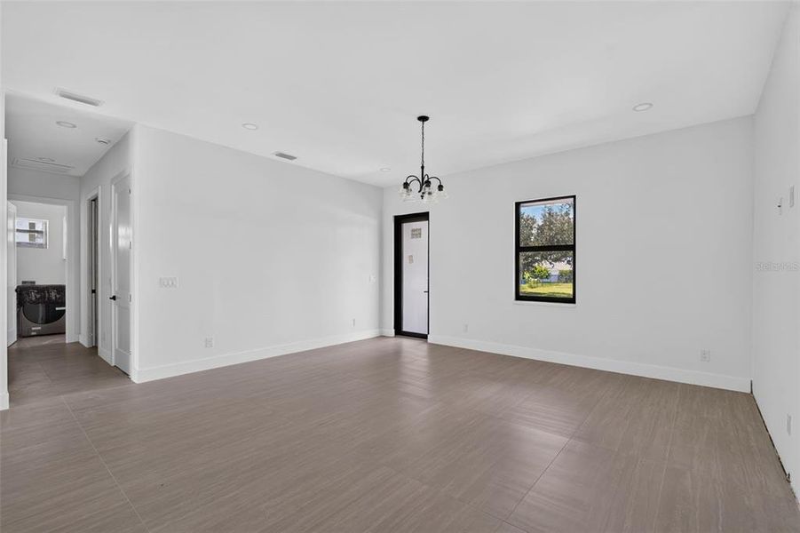 Spacious, unfurnished interior of a new home in , Port Charlotte (Image 11).