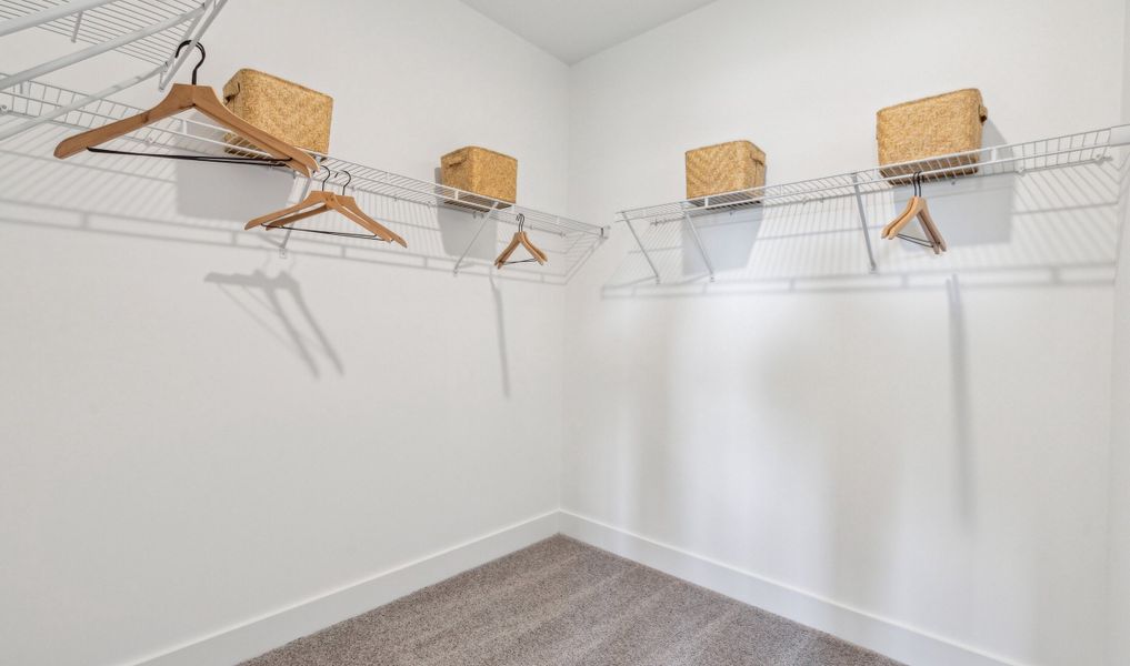 Primary Walk-in Closet Primary Walk-in Closet