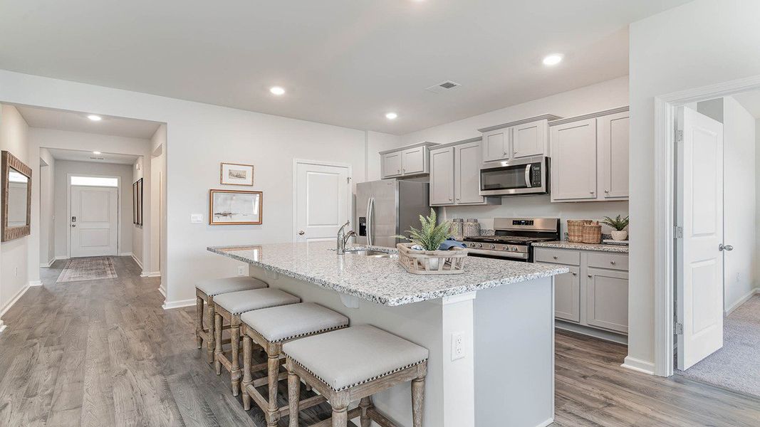 Representative furnished interior of a home built from the ARIA by D.R. Horton in Harper Meadows, Loris (Image 4).