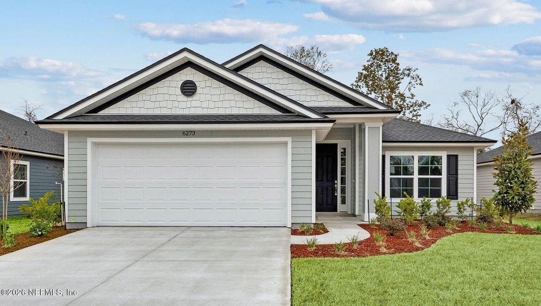 Front exterior of a new home in Weston Woods, Jacksonville, FL, highlighting curb appeal (Image 1). Front exterior of a new home in Weston Woods, Jacksonville, FL, highlighting curb appeal (Image 1).