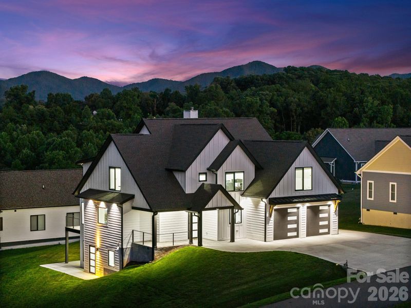 Front exterior of a new home in , Candler, NC, highlighting curb appeal (Image 33). Front exterior of a new home in , Candler, NC, highlighting curb appeal (Image 33).