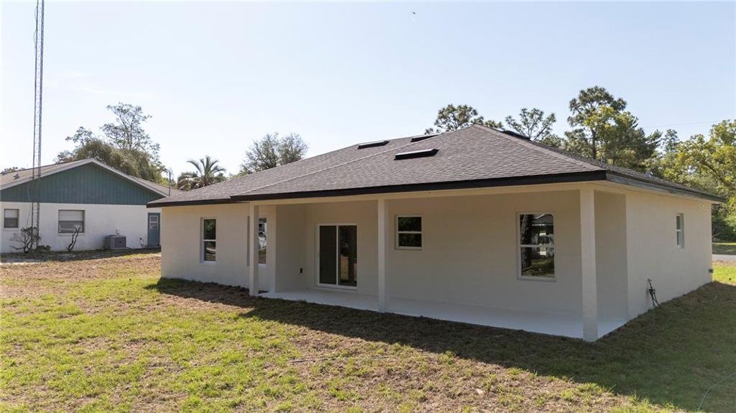 Front exterior of a new home in , Citrus Springs, FL, highlighting curb appeal (Image 1). Front exterior of a new home in , Citrus Springs, FL, highlighting curb appeal (Image 1).