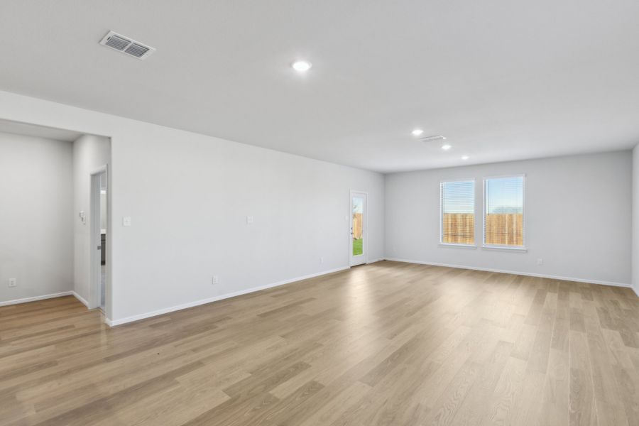 Living Room in the Holden home plan by Trophy Signature Homes – REPRESENTATIVE PHOTO Living Room in the Holden home plan by Trophy Signature Homes – REPRESENTATIVE PHOTO