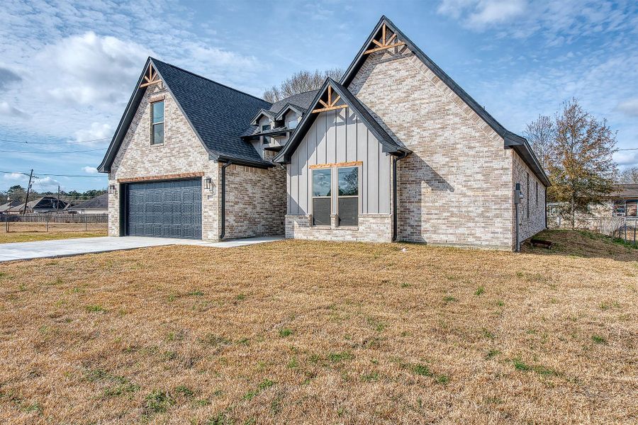 Front exterior of a new home in , Beaumont, TX, highlighting curb appeal (Image 26).