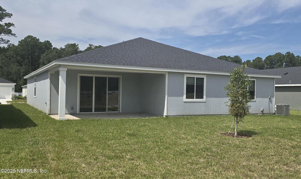 Front exterior of a new home in Azalea Creek, Jacksonville, FL, highlighting curb appeal (Image 2).