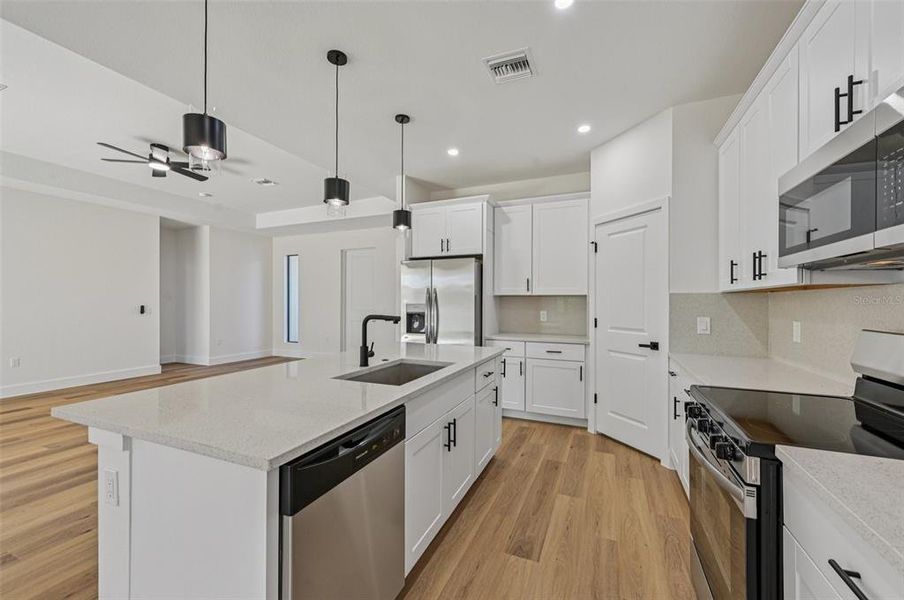 Furnished interior view inside a new home in , North Port (Image 13).