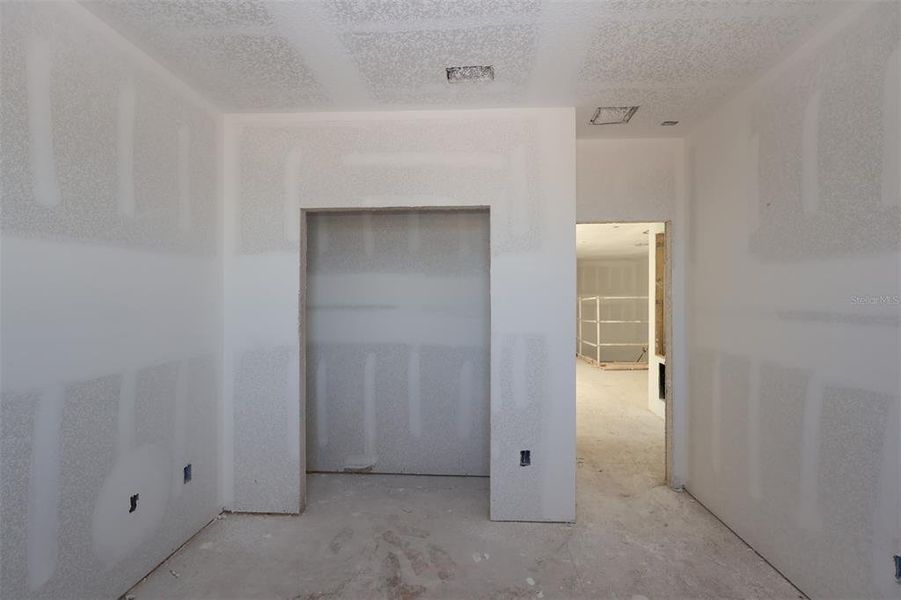 In-progress construction of a new home in Lake Star at Ovation, Winter Garden, FL (Image 18).