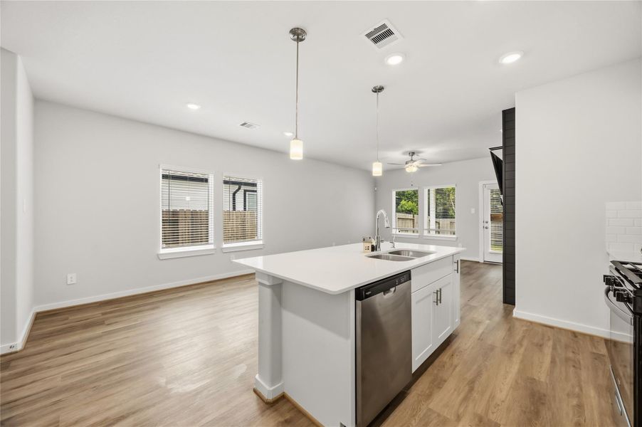 Kitchen island is overlooking the living room. Kitchen island is overlooking the living room.