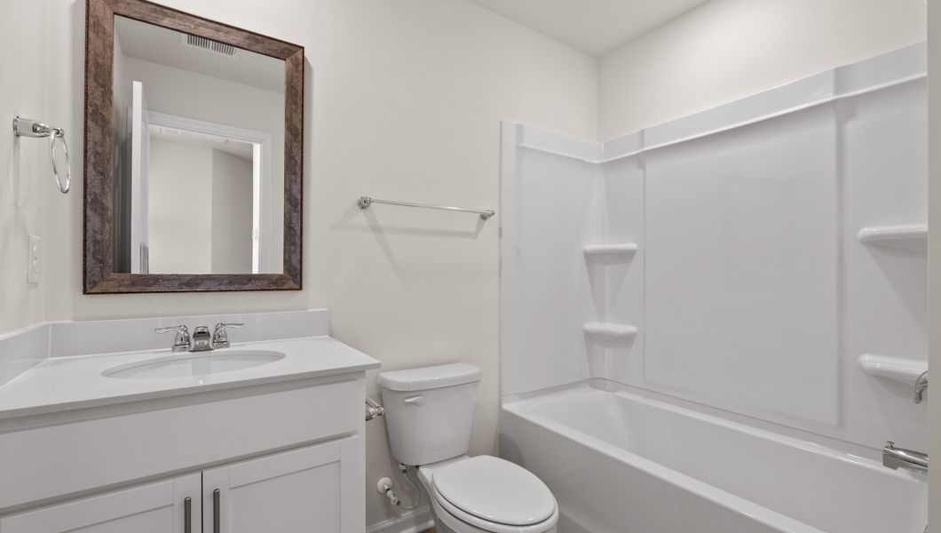 Furnished interior view inside a new home in Tanglewood Townes, Greenville (Image 11).