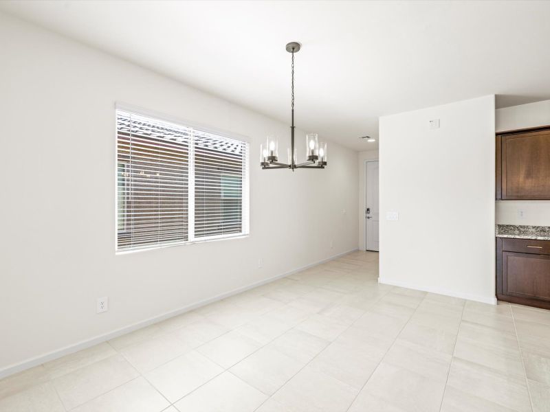 Spacious, unfurnished interior of a new home in Mandarina - Signature Series, Marana (Image 6).