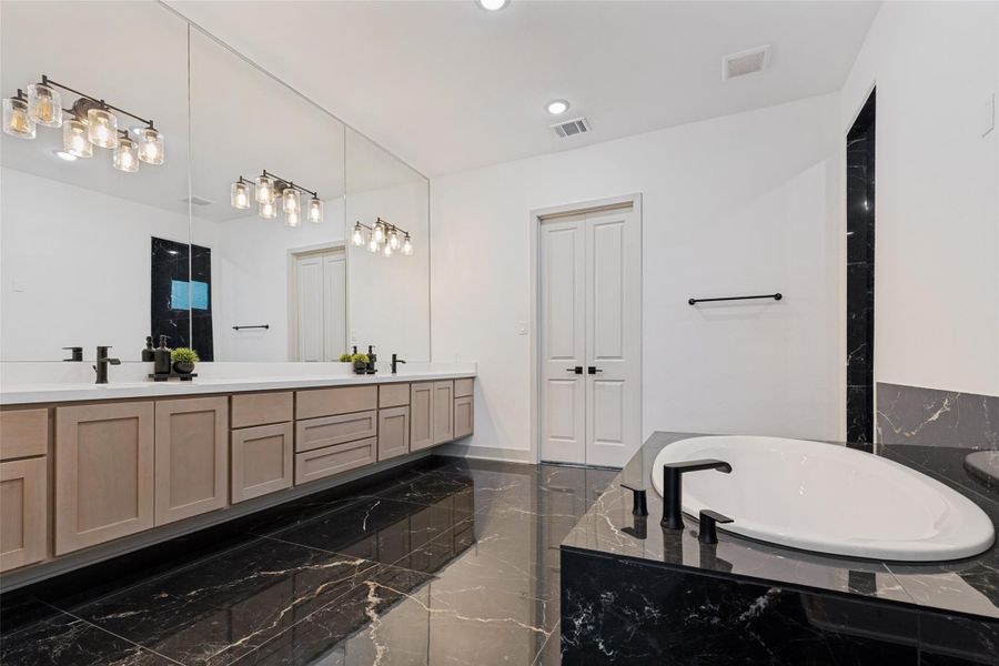 Furnished interior view inside a new home in , Conroe (Image 6).