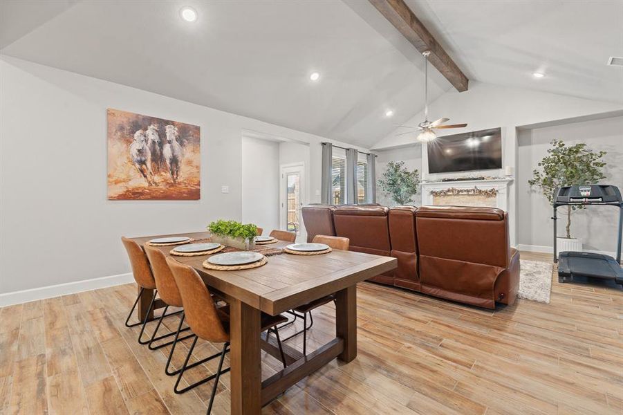 Dining area featuring light wood finished floors, recessed lighting, and a ceiling fan