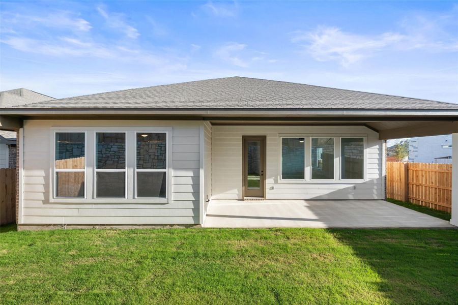 Exterior details and patio area of a home in Lariat, Liberty Hill (Image 25).