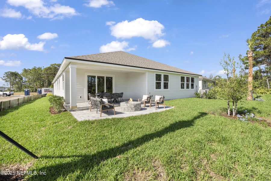 Exterior details and patio area of a home in The Cypress Series at Reserve East, Flagler Beach (Image 4).