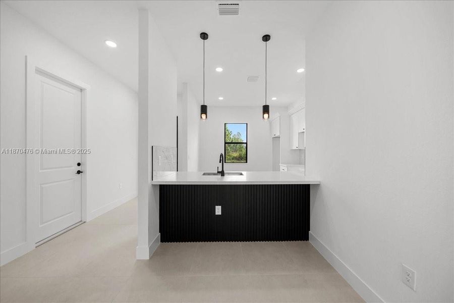 Furnished interior view inside a new home in , Lehigh Acres (Image 5). Furnished interior view inside a new home in , Lehigh Acres (Image 5).