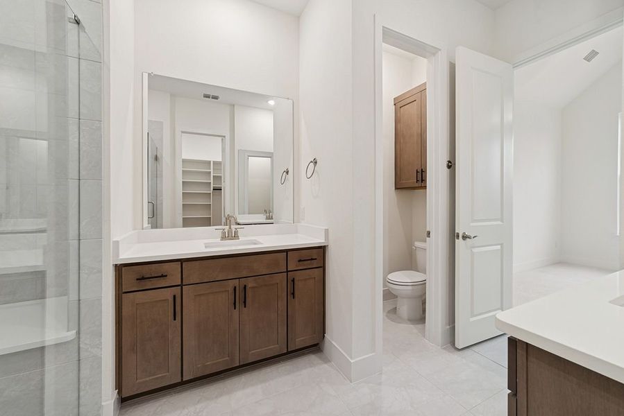 Representative furnished interior of a home built from the Riseley by Landon Homes in Fields - East Village, Frisco (Image 21).