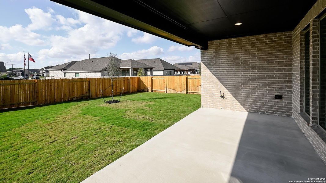 Exterior details and patio area of a home in Meadows Of Mill Creek 50', Seguin (Image 21).