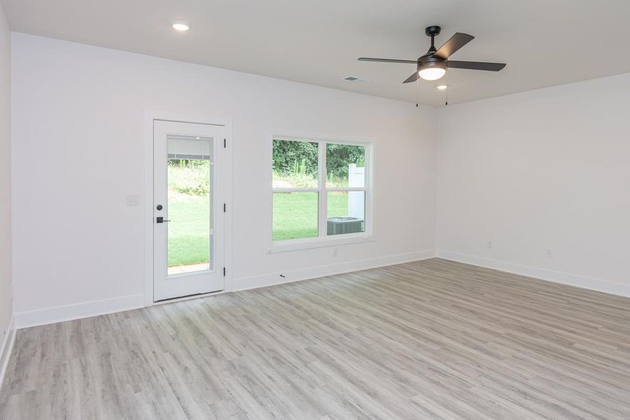Representative unfurnished interior of a home built from the 1692 Townhome by Adams Homes in Parkstone Place Townhomes, Roebuck (Image 13).