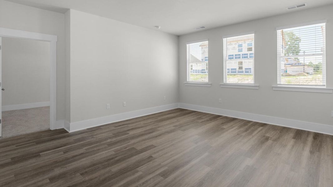 Spacious, unfurnished interior of a new home in Surfside Landing, Hubert (Image 16).
