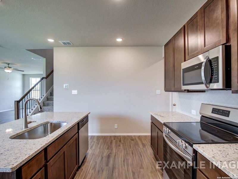 Furnished interior view inside a new home in Bricewood, San Antonio (Image 7).