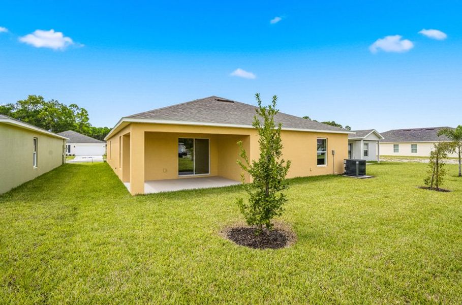 Exterior details and patio area of a home in Richmond Cove, Palm Bay (Image 22). Exterior details and patio area of a home in Richmond Cove, Palm Bay (Image 22).