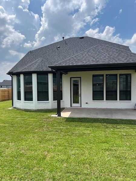 Front exterior of a new home in Katy Court, Katy, TX, highlighting curb appeal (Image 17). Front exterior of a new home in Katy Court, Katy, TX, highlighting curb appeal (Image 17).