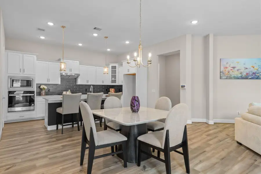 Create unforgettable dining experiences in the Promenade III. Image depicts home as-is.