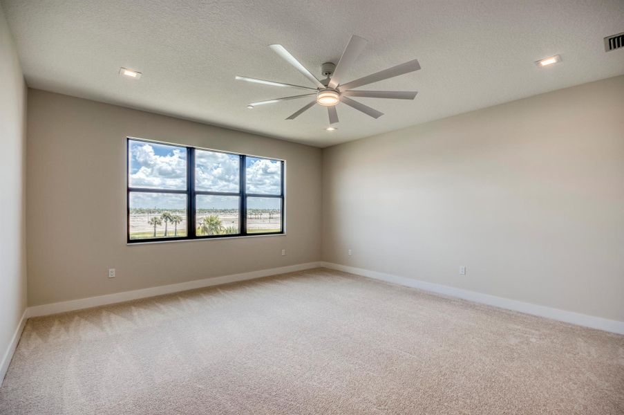 Furnished interior view inside a new home in Apex at Avenir, Palm Beach Gardens (Image 18).