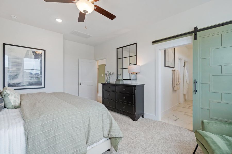 Furnished interior view inside a new home in Bridgeland, Cypress (Image 16).