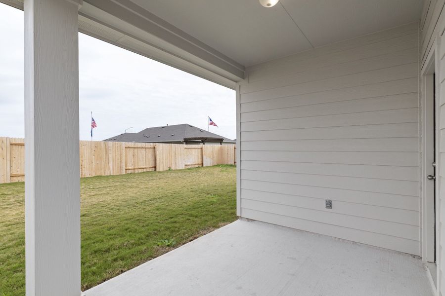 Exterior details and patio area of a home in Village at Three Oaks, Seguin (Image 3).